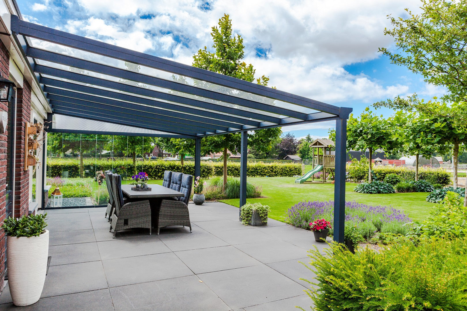 506 cm breed Pigato terrasoverkapping met glas